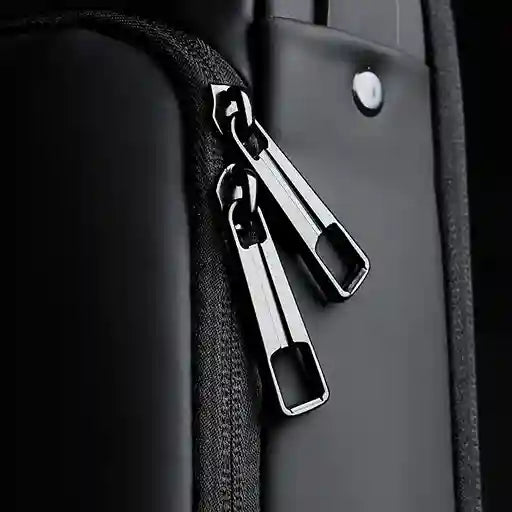 Metallic car seat clip attached to a car seat