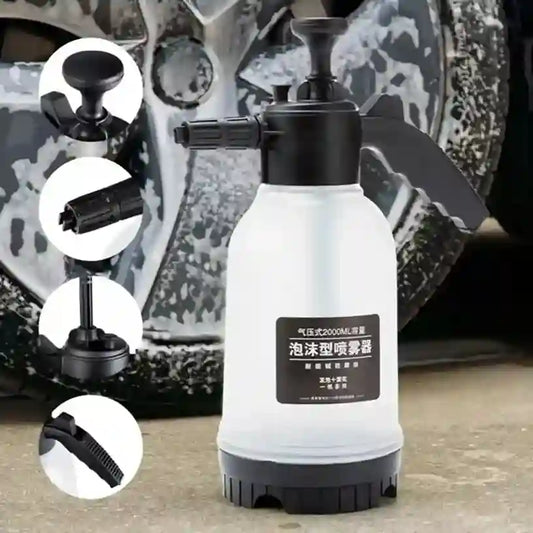 Foam cannon for car washing with attachments on a car wheel background