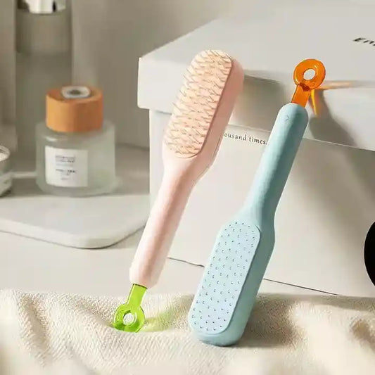 Two cleaning brushes with different handles on a surface.