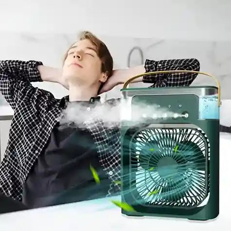 Person relaxing with a portable air conditioning unit in a room.