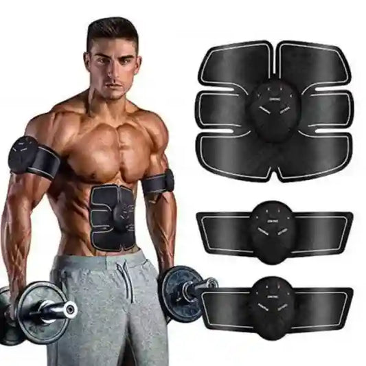 Man with muscular build holding dumbbells next to black EMS muscle stimulators on a white background