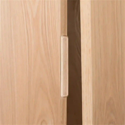 Close-up of a wooden cabinet with a handle