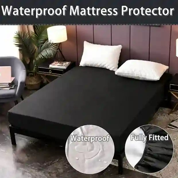 Black waterproof mattress protector on a bed with room decor.