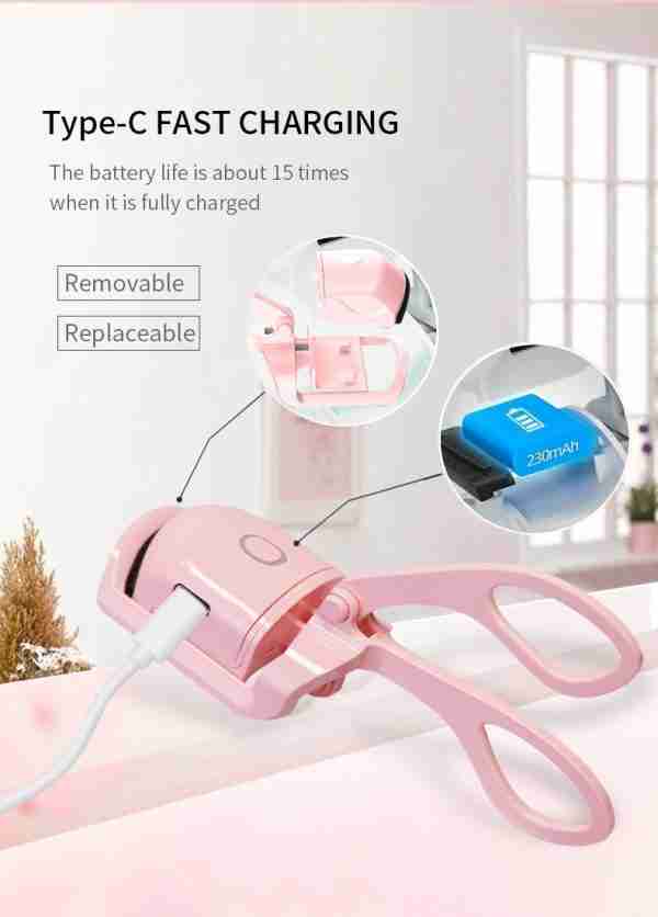 Pink electronic device with charging cable on a white background