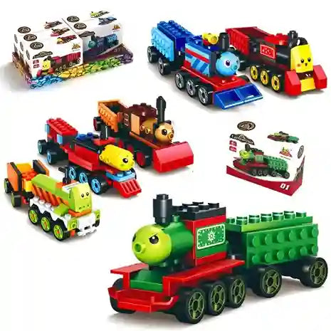 Collection of toy trains and building blocks on a white background