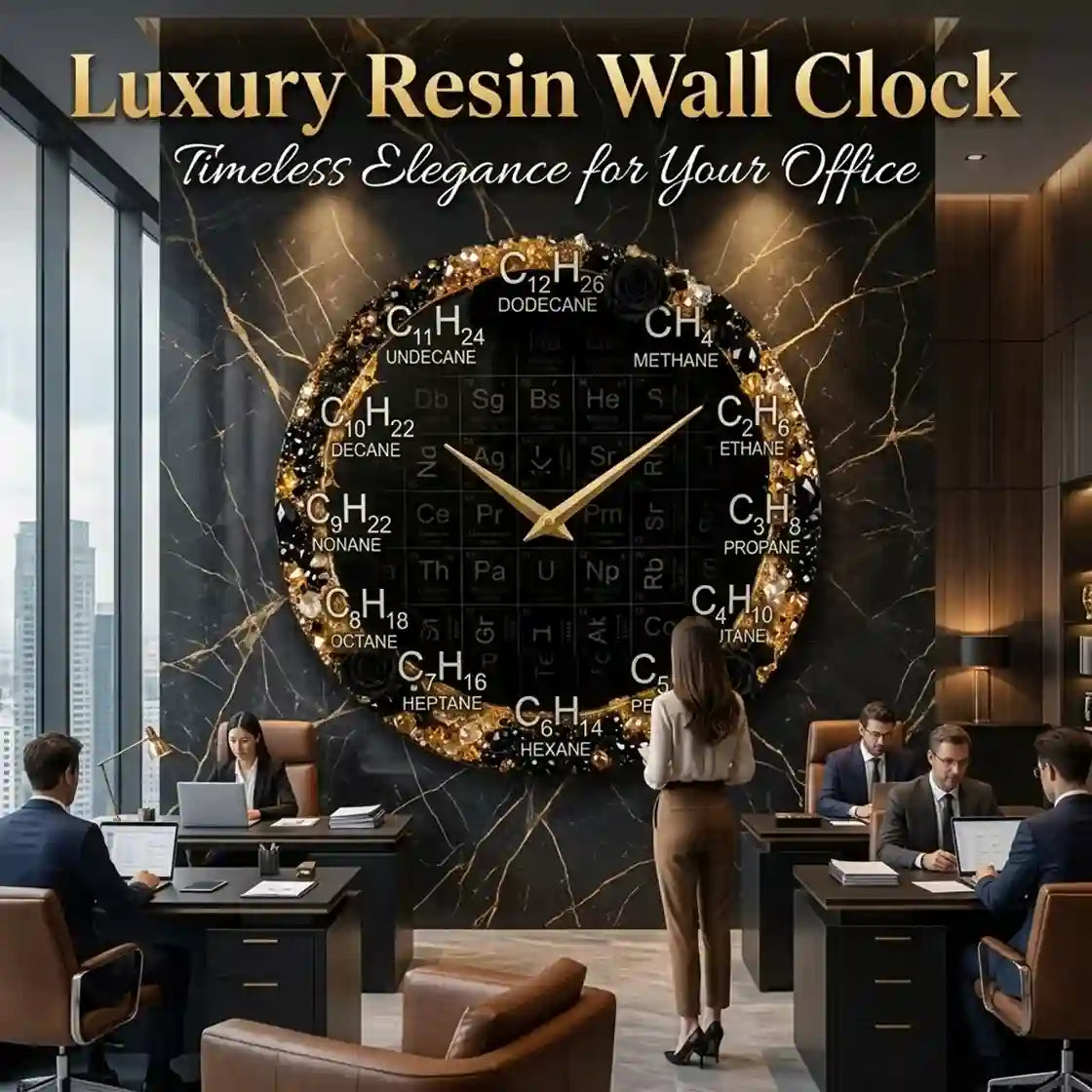 Luxury resin wall clock with a black background and gold floral accents, featuring a periodic table of elements design. The clock is mounted on a dark marble office wall, with office workers visible in a modern office setting.