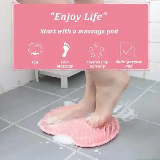 Person using a pink massage pad on a bathroom floor with text overlay.