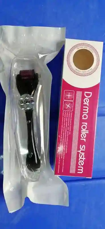 Derma roller system with packaging on a blue background