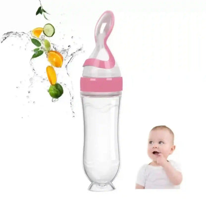 Pink baby bottle with fruit pieces and a baby on a white background