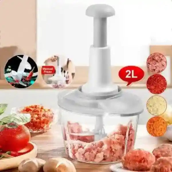 Manual meat grinder with ground meat and ingredients on a wooden board