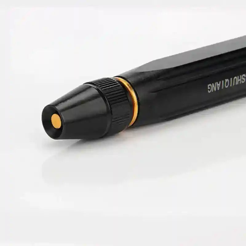 Black pen with gold accents on a white background