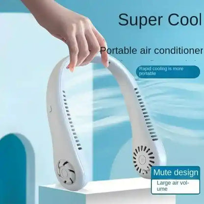 Portable air conditioner with hand holding it against a blue background