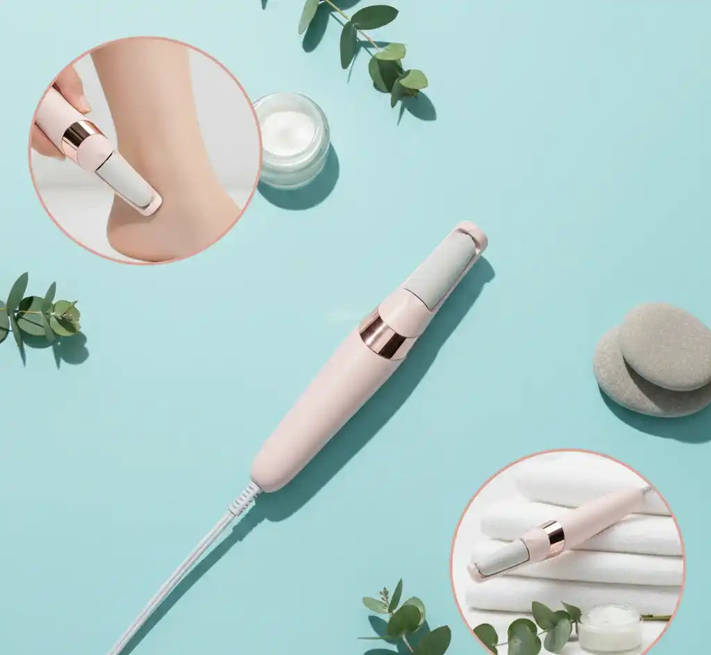 Pink electronic device on a light blue background with green leaves