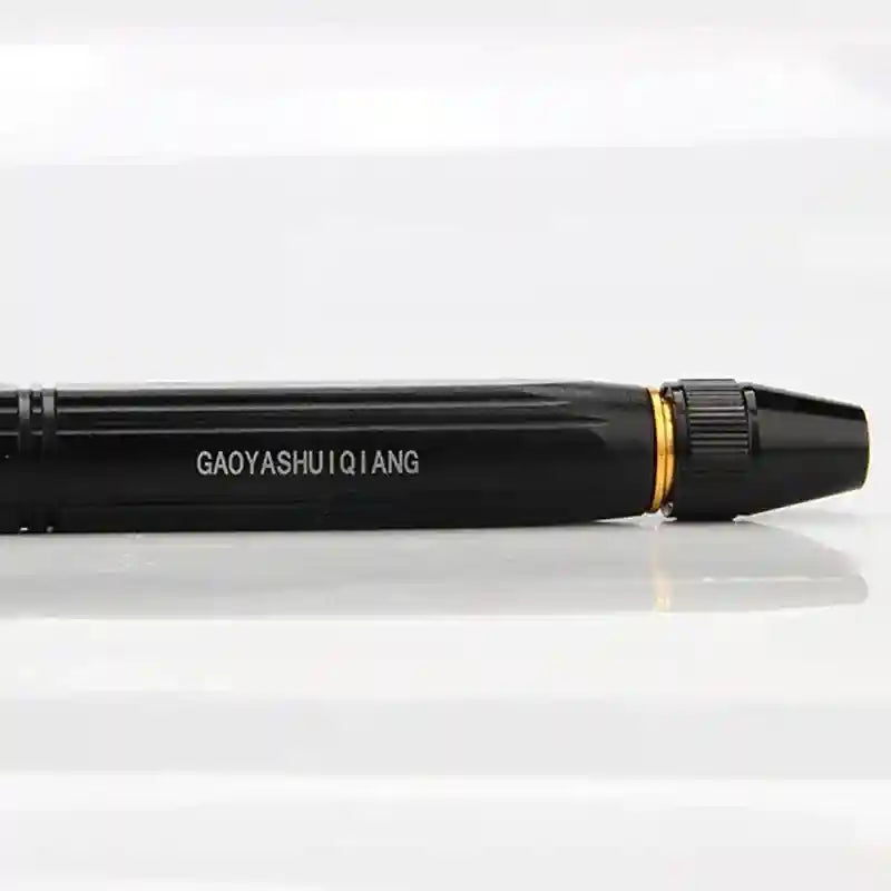 Black pen with gold accent on a white background