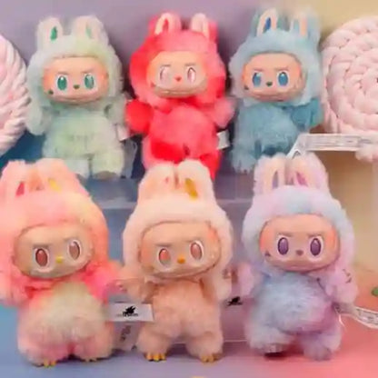 Colorful plush toys with bunny ears on a shelf