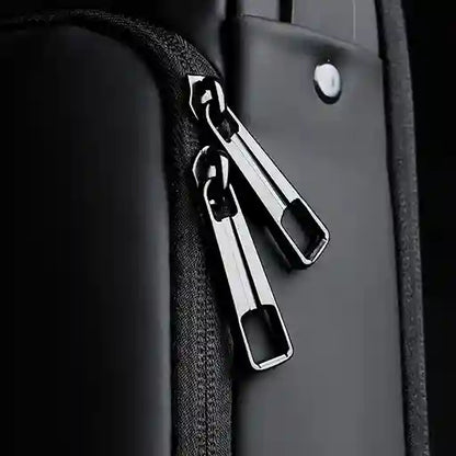 Metallic car seat clip attached to a car seat