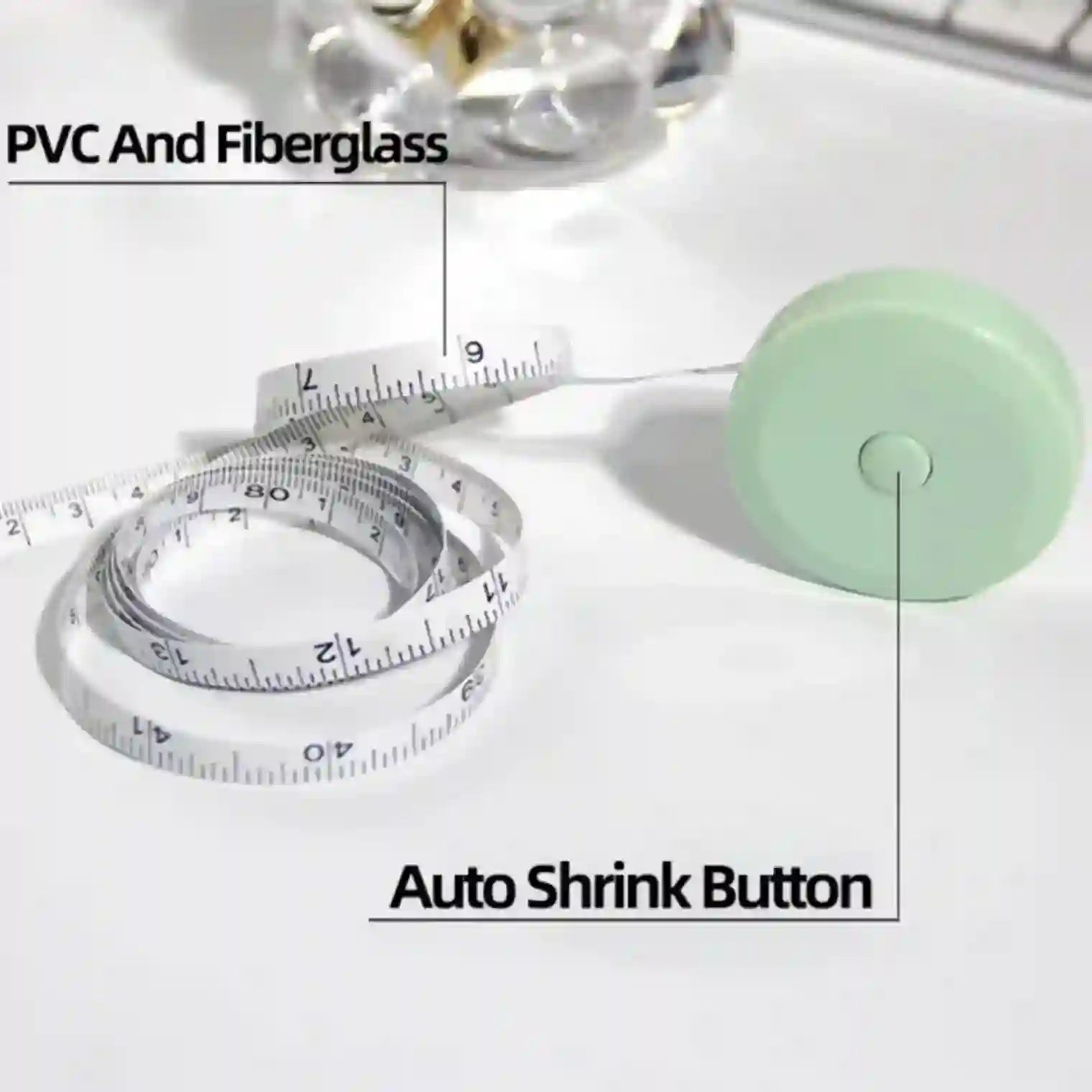 Measuring tape with an auto shrink button on a white background