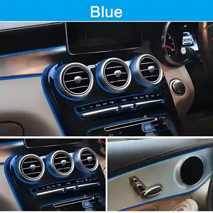 Car interior with blue accent trim on air vent and dashboard