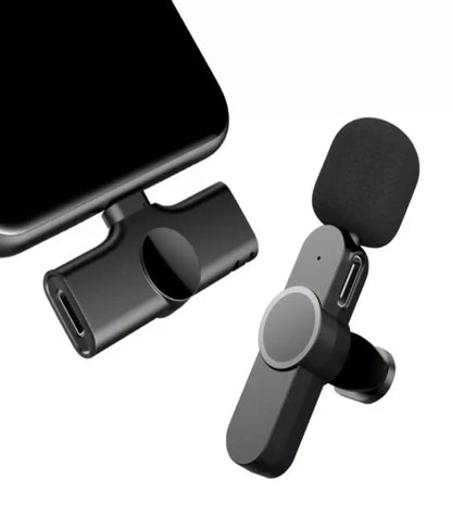 Phone clip microphone with smartphone on a white background