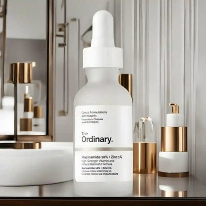The Ordinary skincare serum bottle on a bathroom counter with other products.