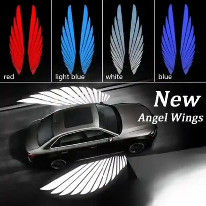 Car with angel wing decals in red, light blue, white, and blue on a black background.