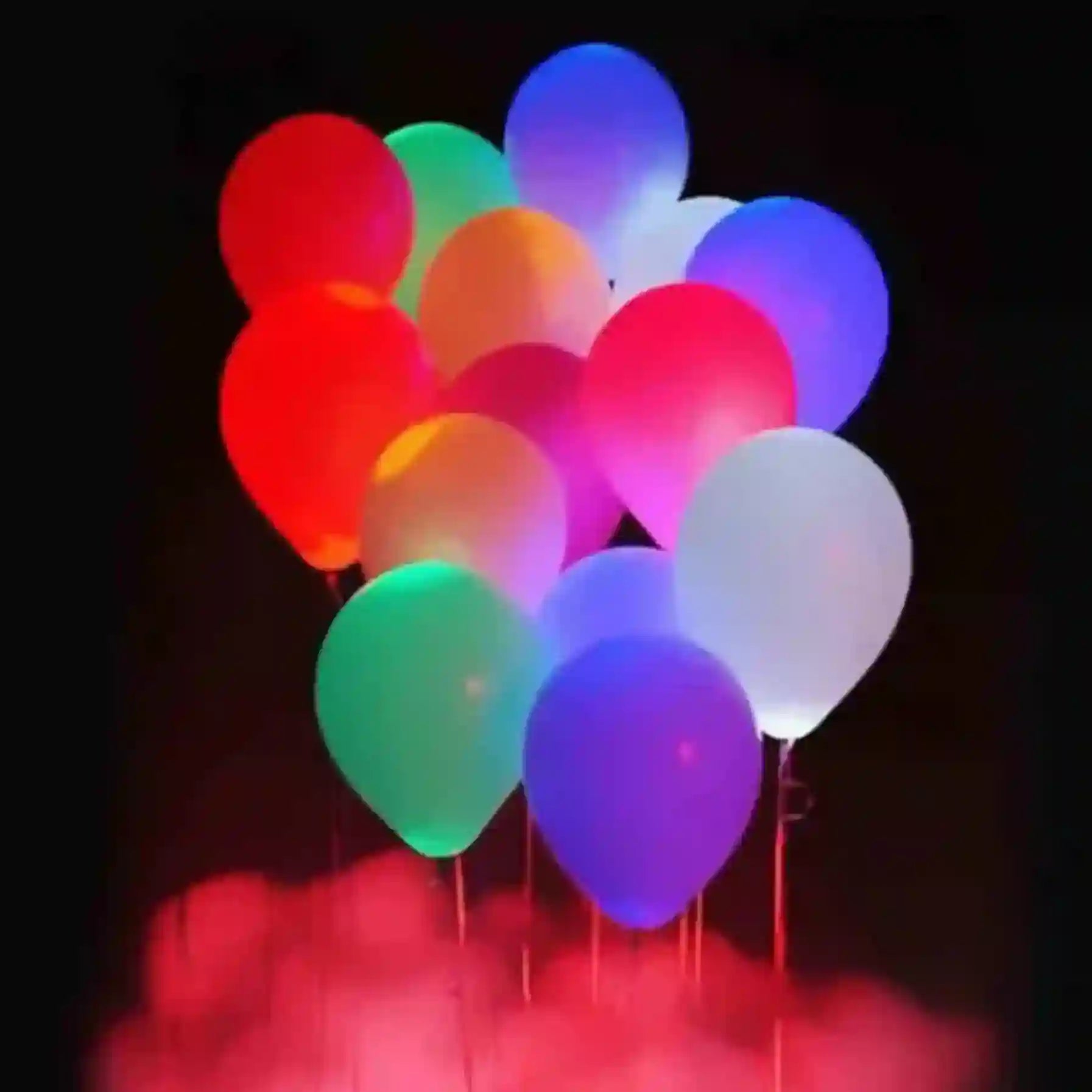 Colorful LED balloons on a dark background