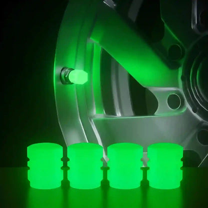 Green wheel locks on a car wheel with a dark background
