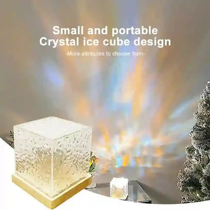 Small and portable crystal ice cube design with a warm glow, placed on a surface with a blurred background.