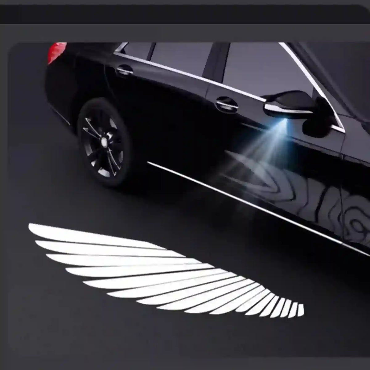Car with a winged emblem projected onto the ground