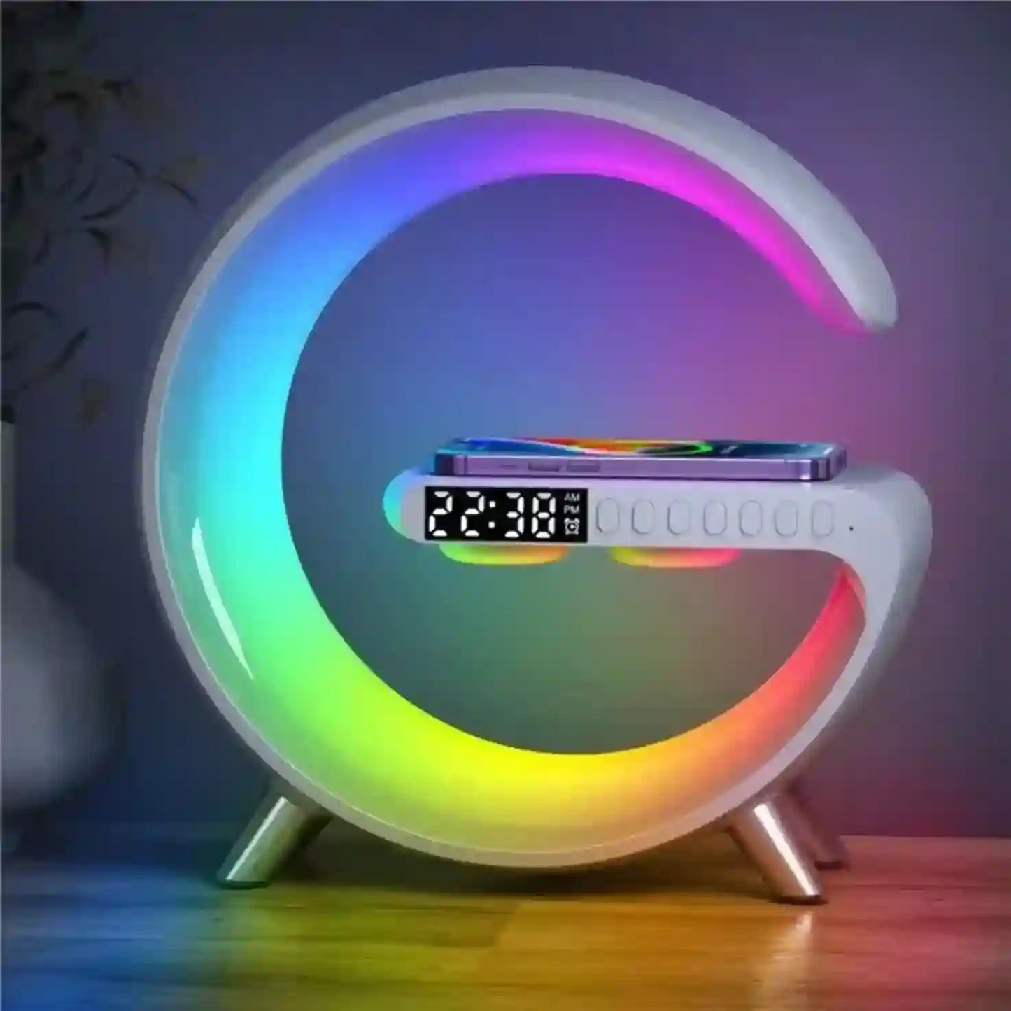 Colorful LED night light with digital clock on a wooden surface