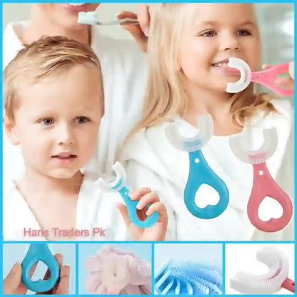Two children using baby toothbrushes with a focus on a blue and pink toothbrush.
