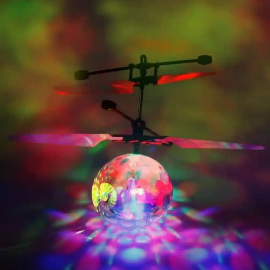 Toy helicopter with colorful LED lights on a multicolored background
