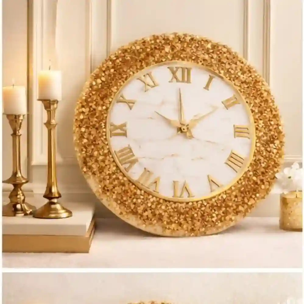 Decorative wall clock with gold embellishments on a neutral background