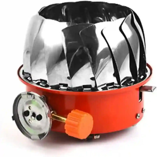 Red camping stove with reflective top on a white background