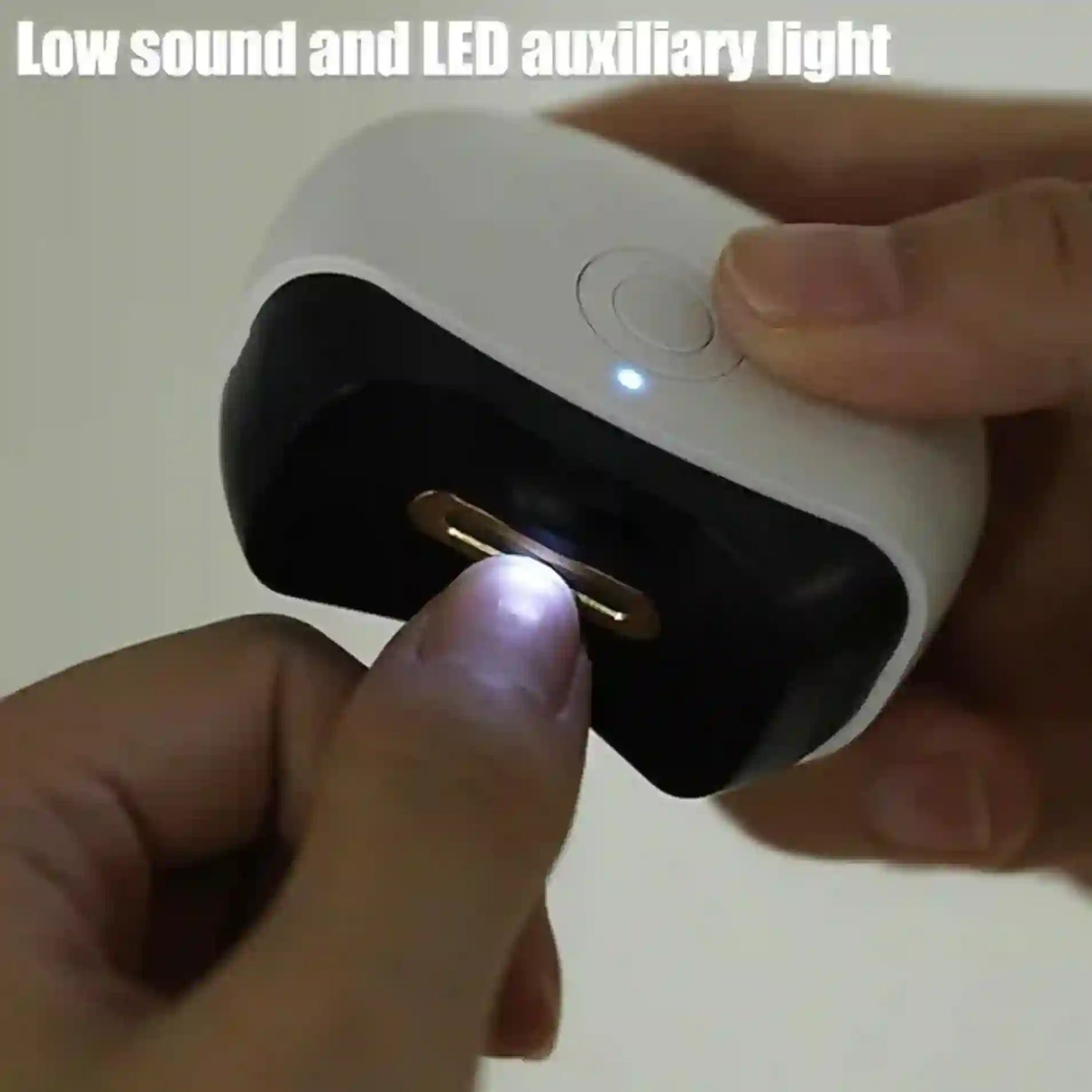 Hand holding a device with a button and LED light, labeled 'Low sound and LED auxiliary light'.