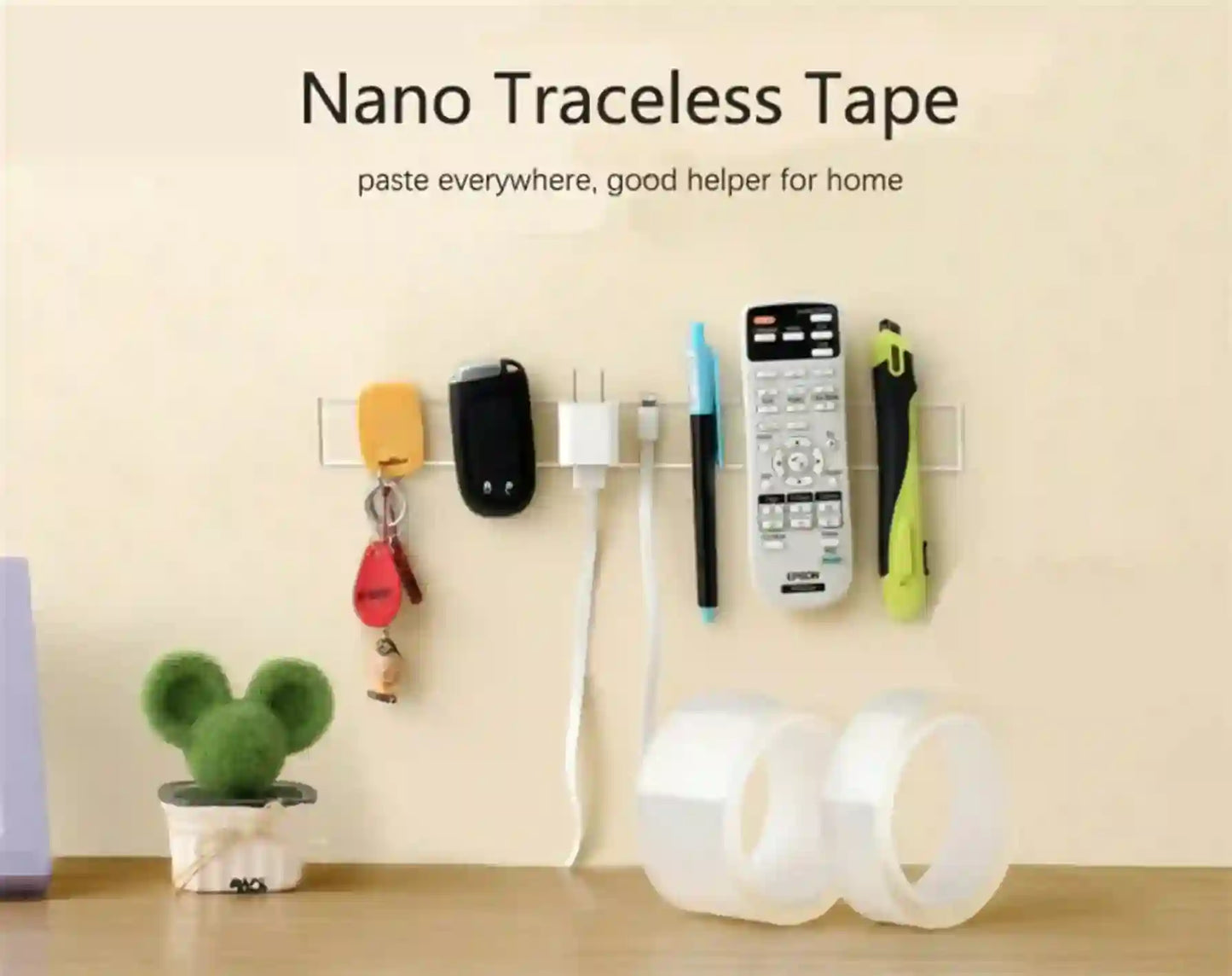 Nano traceless tape with various items attached on a wall
