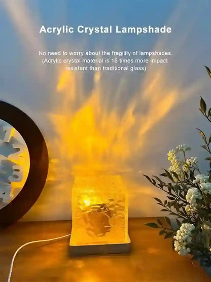 Acrylic crystal lampshade with decorative elements on a surface.