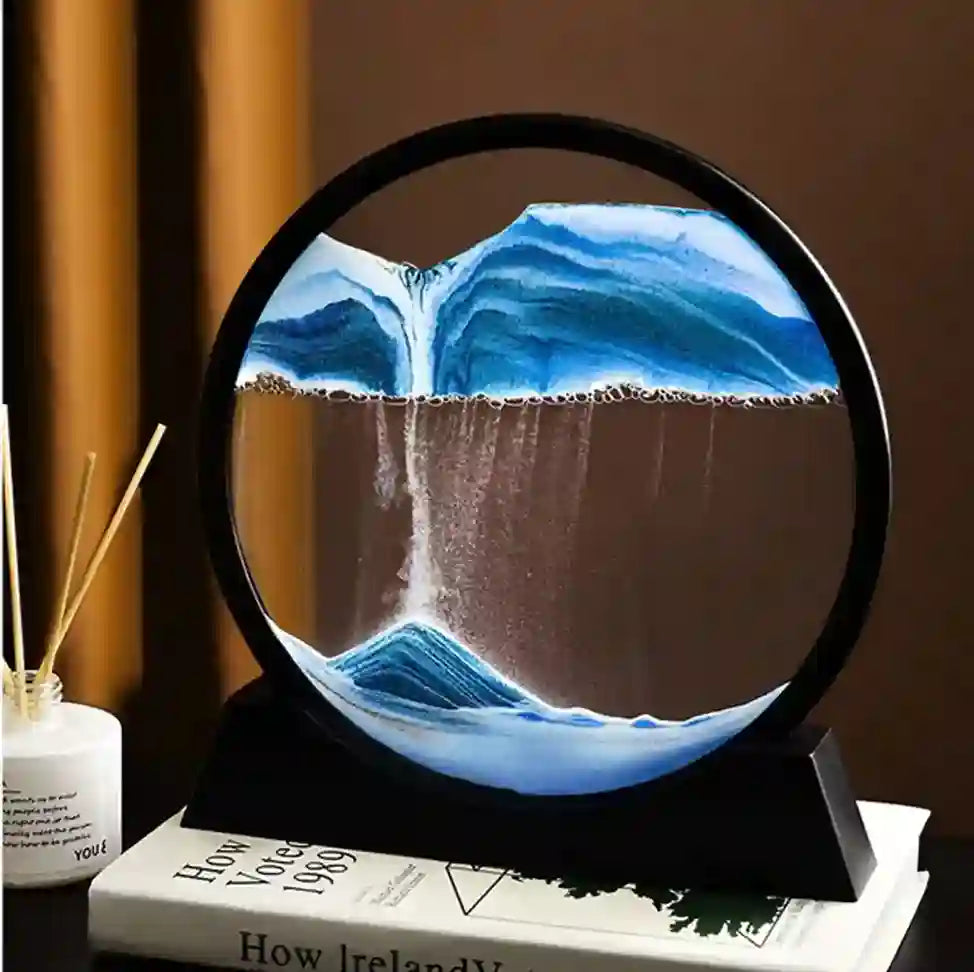 Decorative lamp with a wave design on a black base, placed on books.
