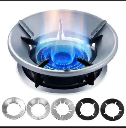 Stainless steel gas stove burner with blue flame and additional rings on a white background