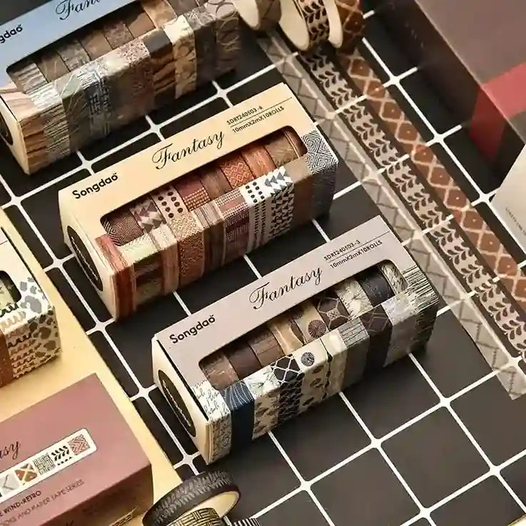 Rolls of tape with 'Fantasy' packaging on a grid background