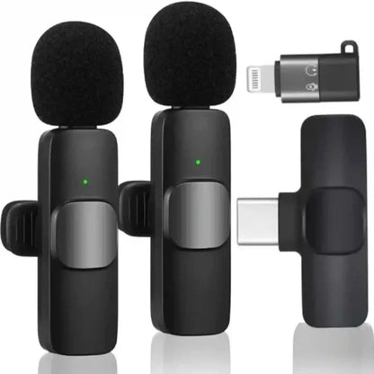 Two black microphones with clip-on attachments and a receiver on a white background
