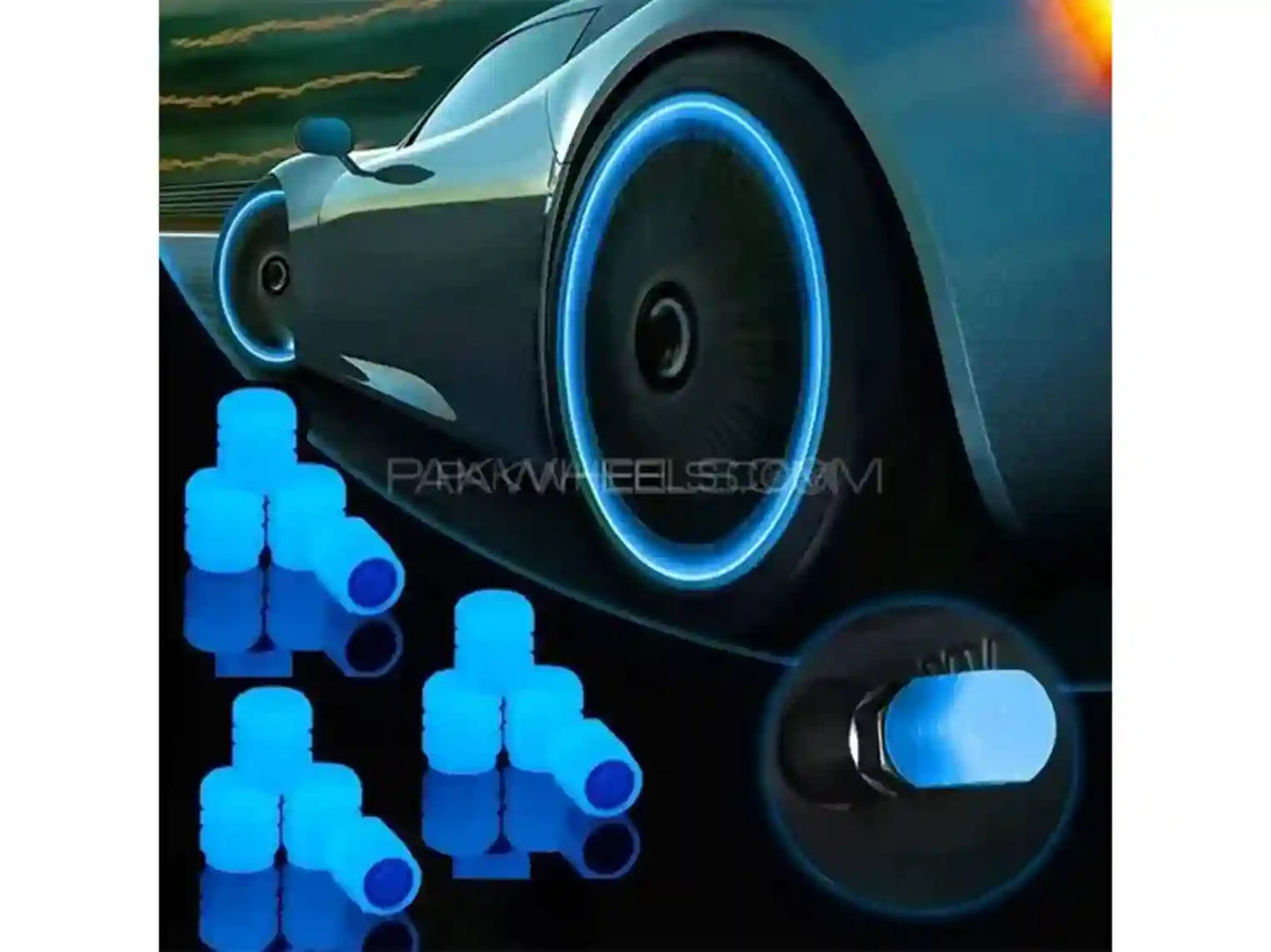 Car wheel with glowing blue rim and a set of blue wheel locks on a dark background.