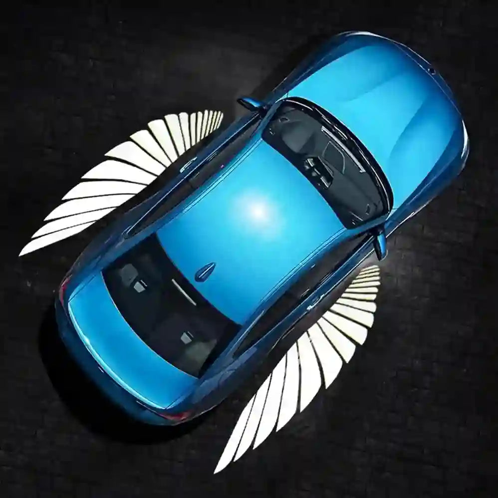 Blue car on a dark background with white wing-like designs