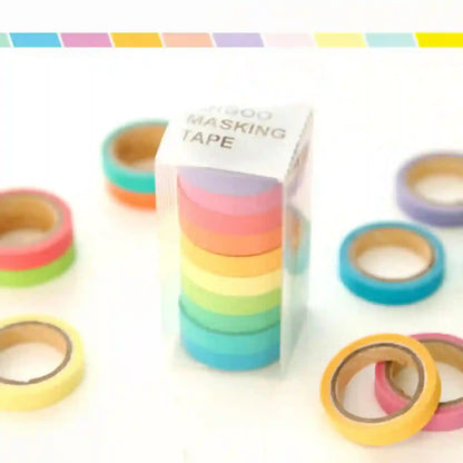 Colorful masking tape rolls with a box on a white background