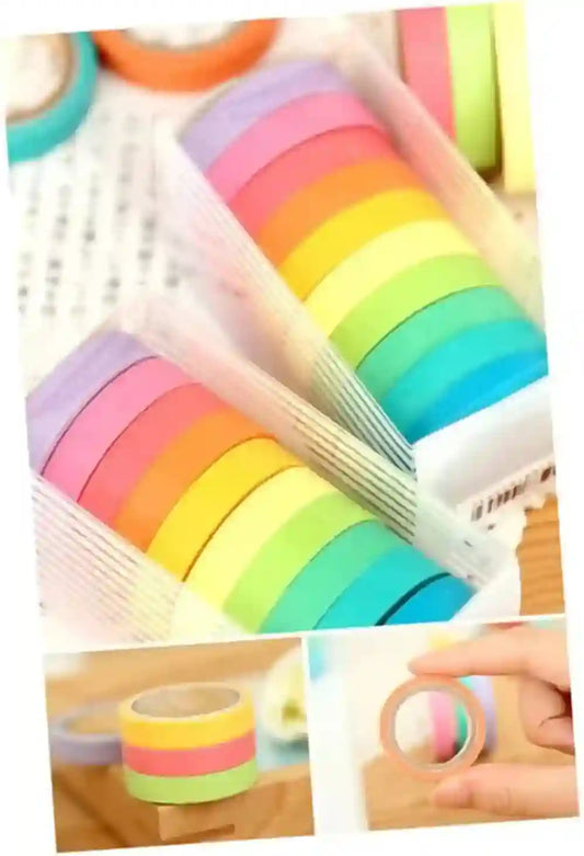 Set of colorful washi tape rolls with a close-up of a hand holding a roll.