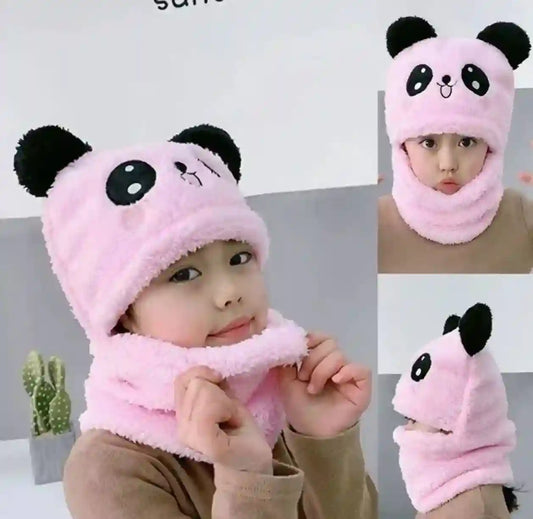 Child wearing a pink panda hat and scarf with a white background