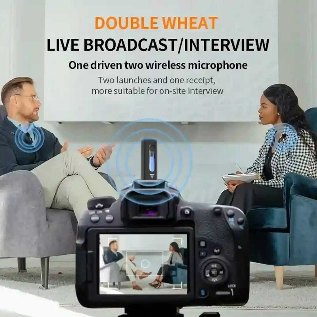 Two people engaged in a live broadcast/interview with a camera showing the scene.