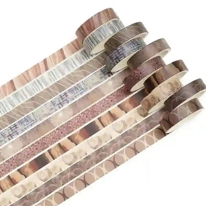 Set of decorative tape rolls with various patterns on a white background