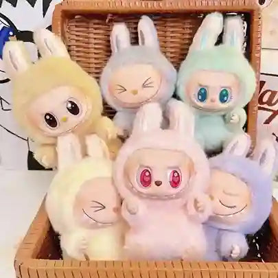Set of colorful cartoon-style plush toys in a woven basket
