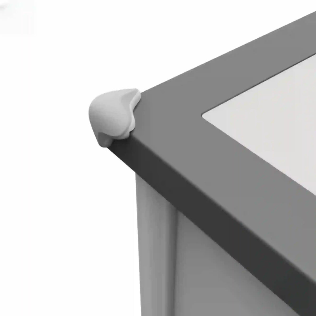 Corner of a gray metal frame with a white background